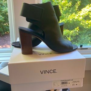 Vince black leather boots in exceptional condition. Barely worn. Size 8.5 M